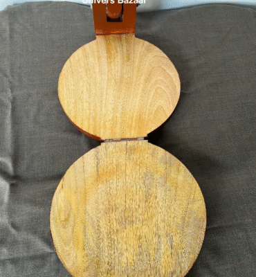   wooden roti maker